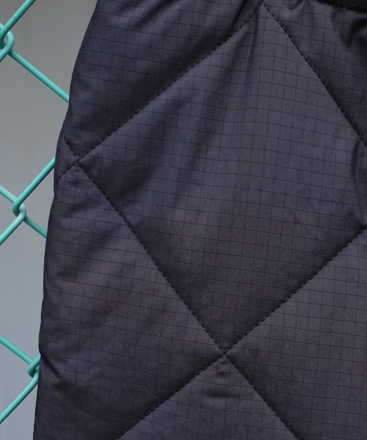 NEAT / RHOMBUS QUILTING TRACK PANTS | Burnish