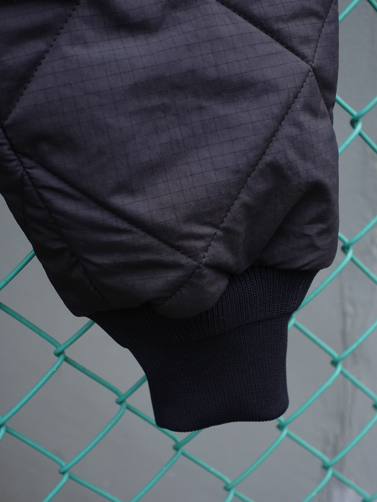 NEAT / RHOMBUS QUILTING TRACK PANTS | Burnish