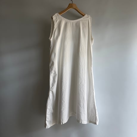 white cotton sleeveless one-piece