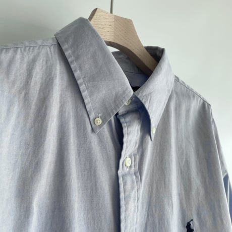 Over light blue  shirt