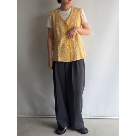 Yellow vest with flower embroidery