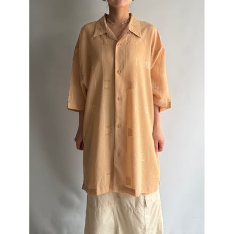 Pastel orange design shirt