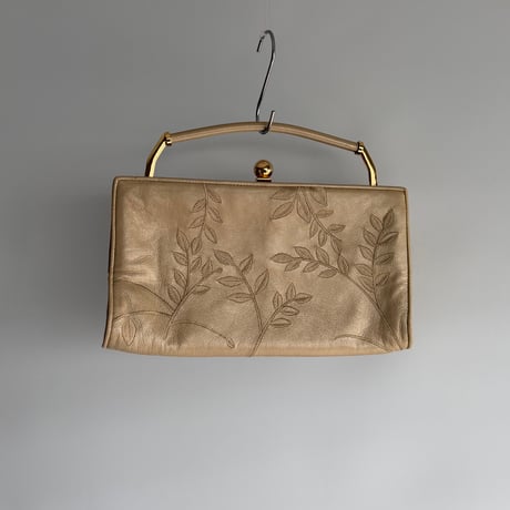 Embroidery beige clutch bag