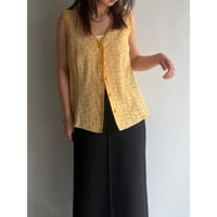 Yellow vest with flower embroidery