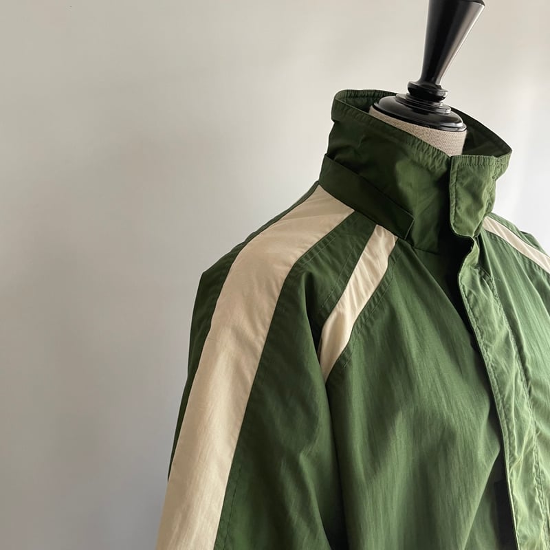 White line green jacket | and C