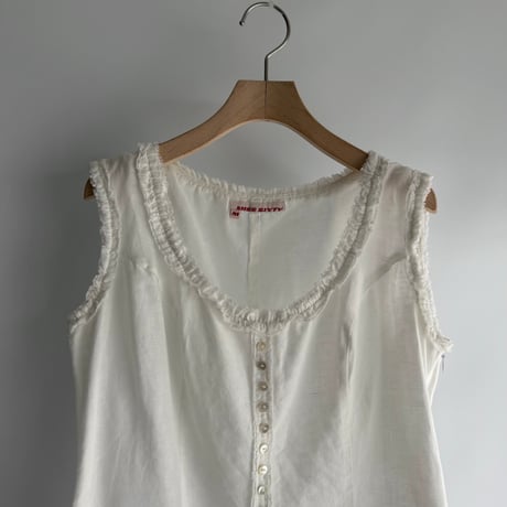 Frilled sleeveless tops