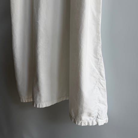white cotton sleeveless one-piece