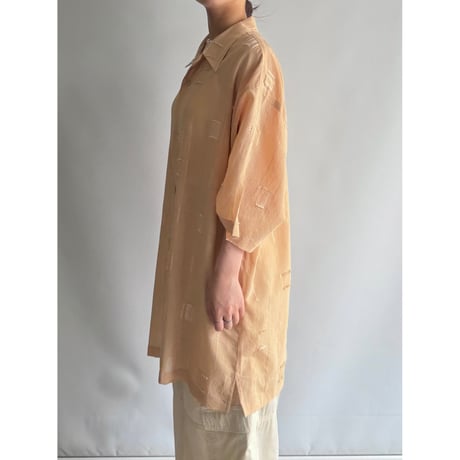 Pastel orange design shirt