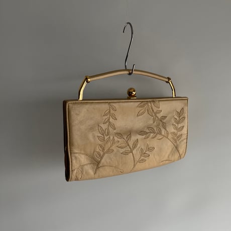 Embroidery beige clutch bag