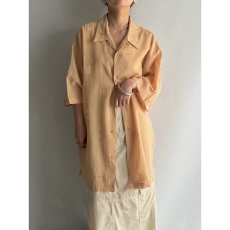 Pastel orange design shirt