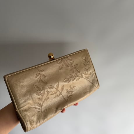 Embroidery beige clutch bag