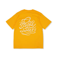 CSN × OMB LETTER LOGO TEE GOLD