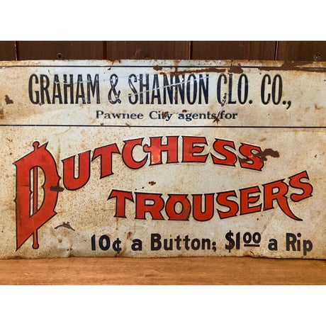 1920's Dutchess Trousers Co. Tin Sign