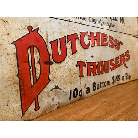 1920's Dutchess Trousers Co. Tin Sign