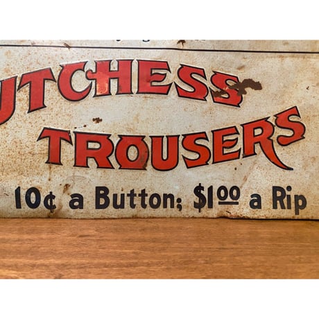 1920's Dutchess Trousers Co. Tin Sign
