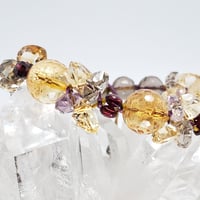 シトリンクォーツとガーネットとスモーキークォーツの組紐ブレスレット