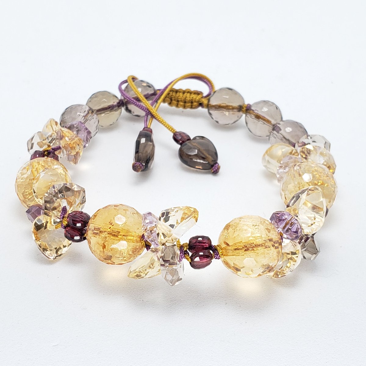 シトリンクォーツとガーネットとスモーキークォーツの組紐ブレスレット