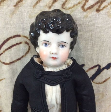 チャイナヘッドの男の子　又は男装の麗人