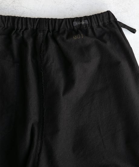 COMOLI _ コットンネル テーパードパンツ