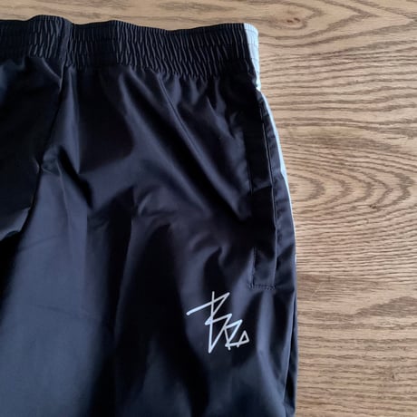 WIND BRAKER  pants black × white
