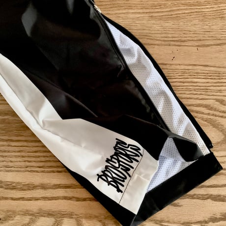 WIND BRAKER  pants black × white