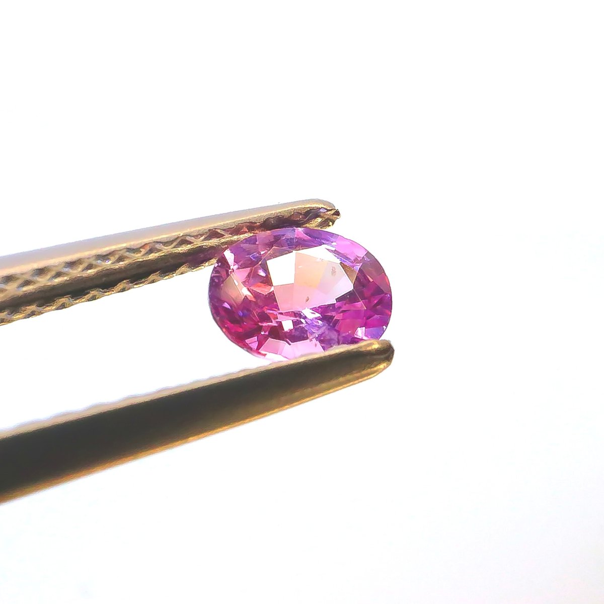 スリランカ産 ピンクサファイア バイカラー 蛍光 0.491ct オーバル 