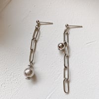 asymmetry chain ball pierce