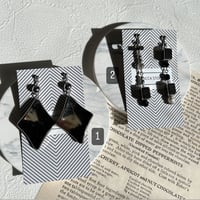 シルバーひし形ピアスor silver black asymmetry