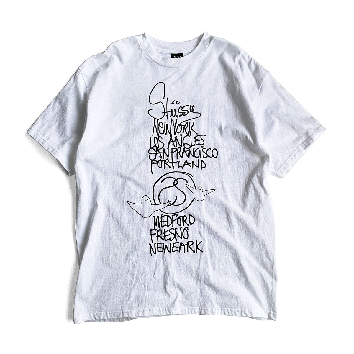 Stussy x Mark Gonzales WORLD TOUR Tee | instant Stussy x Mark Gonzales WORLD TOUR Tee | instant
