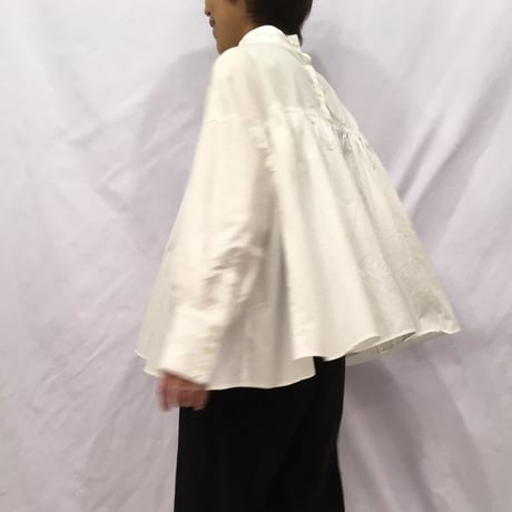 UNIVERSAL TISSU モックネックブラウス　クロストライプ