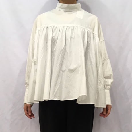 UNIVERSAL TISSU モックネックブラウス　クロストライプ