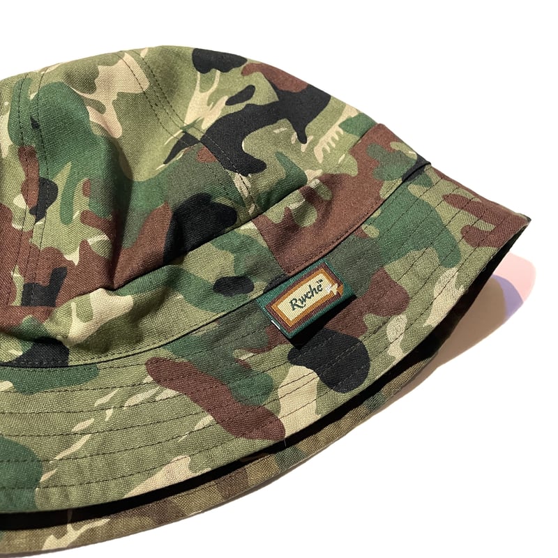 Rwche 迷彩 リバーシブル バケットハット RWCHE - REVRSIVER CAMO HAT | LOFT