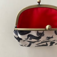 swatch…🐈‍⬛  CLASP purse