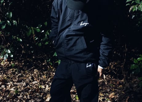 LOST EMB NYLON SETUP【JACKET+PANTS】