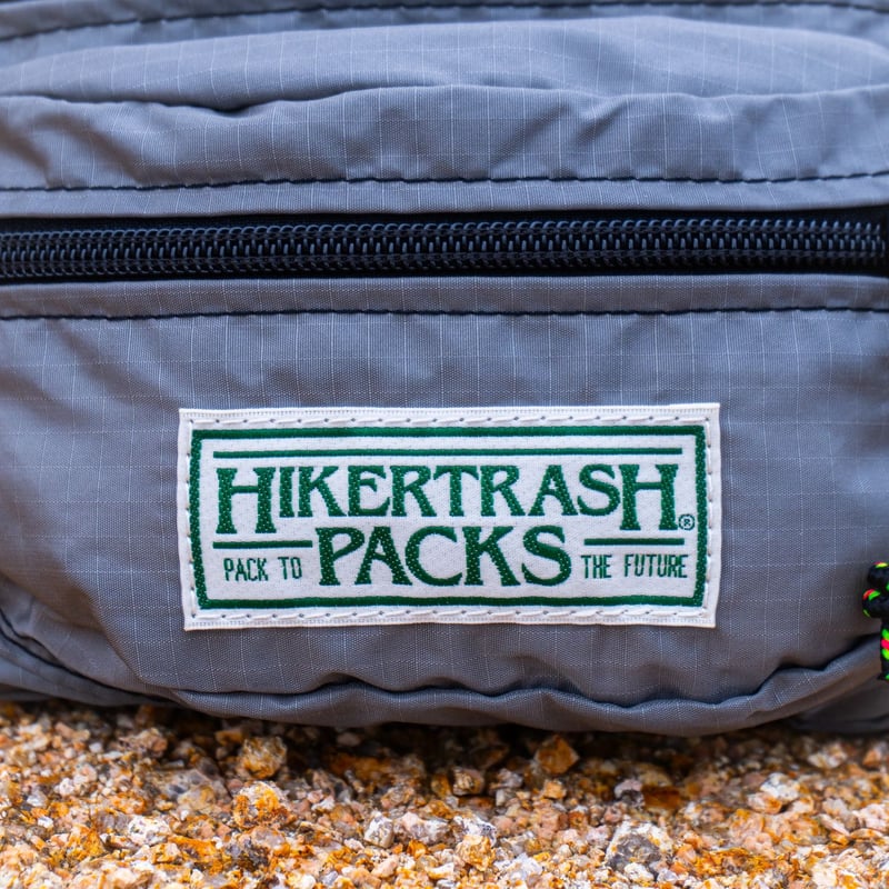 HIKER TRASH PACK TO THE FUTURE ハイカートラッシュ HIKER TRASH ハイカートラッシュ / PACK TO THE FUTURE BLACK / PURPLE