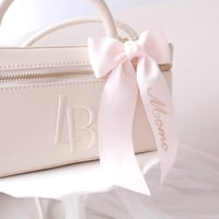Name embroidery bow bag charm