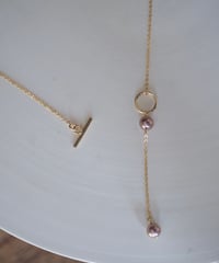 plum mantel necklace