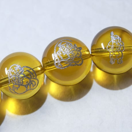 [beads409] 彫りビーズ・合成シトリン（七福神）10mm 7個セット