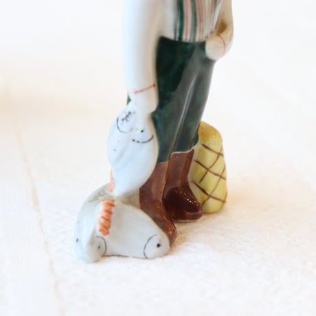 arabia fishing boy figurine