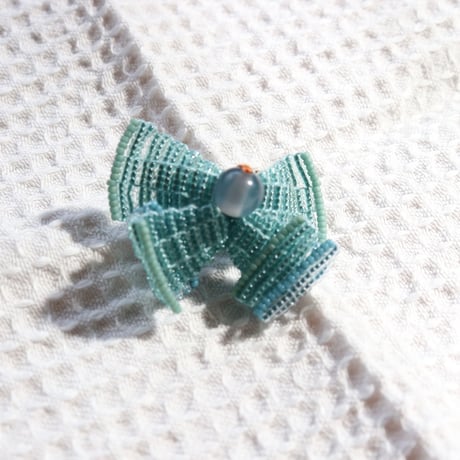 tamas ēli ēli brooch blue