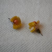 tamas sony yellow  pierce