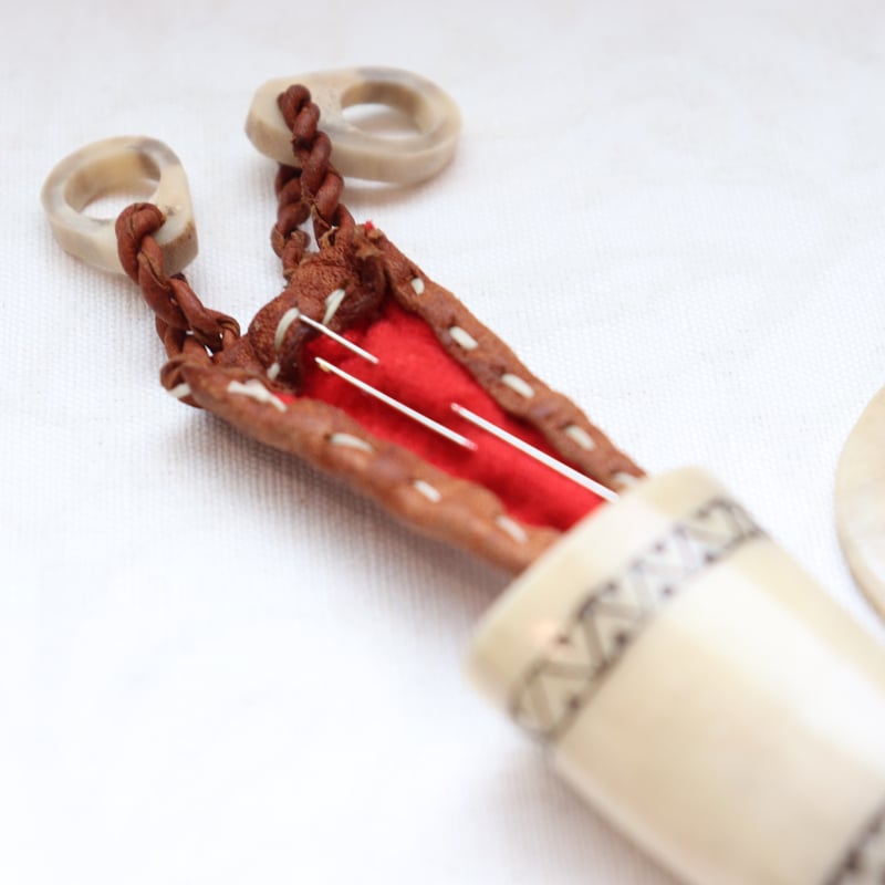 Vintage Saami reindeer antler needle case | plum