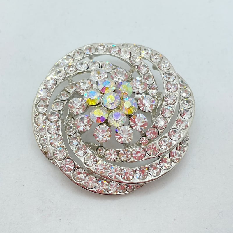 渦巻きのブローチ (フランス製)クリア/ゴールド/グレー35101-40-801