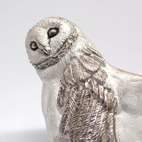 首傾げるメンフクロウリング(white)