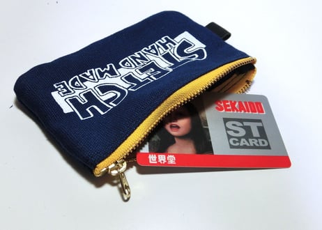 シルクスクリーンプリント入りファスナー帆布ポーチ／ネイビー×黄色ジップ
