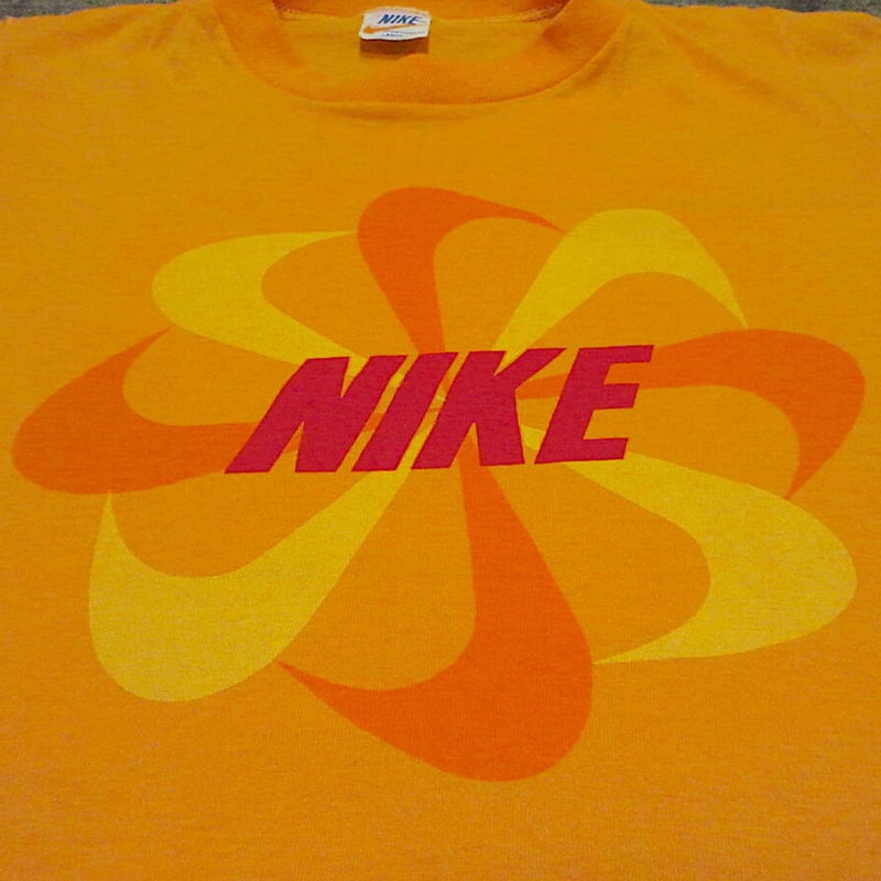 ビンテージ70's○NIKEキッズオレンジスウォッシュ風車プリントTシャツ