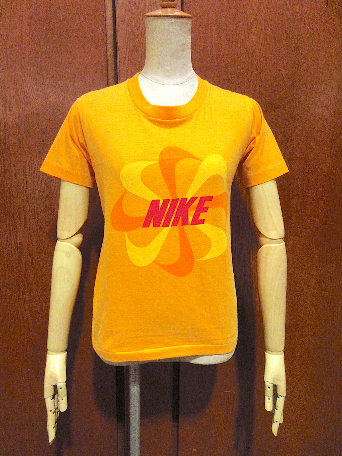 ビンテージ70's○NIKEキッズオレンジスウォッシュ風車プリントTシャツ