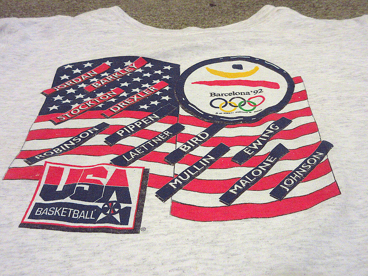 ドリームチーム　1992バルセロナオリンピック　Tシャツ 92年バルセロナオリンピック ドリームチーム Tシャツ - メルカリ