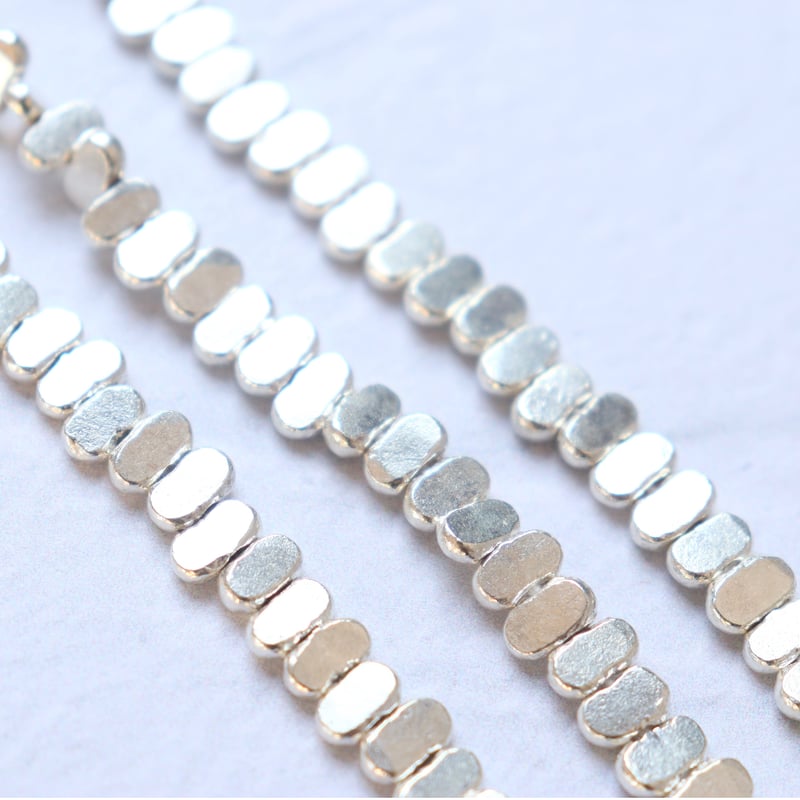 KB-057 カレンシルバー フラットオーバルビーズ | EREN gemstones