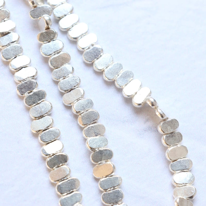 KB-057 カレンシルバー フラットオーバルビーズ | EREN gemstones